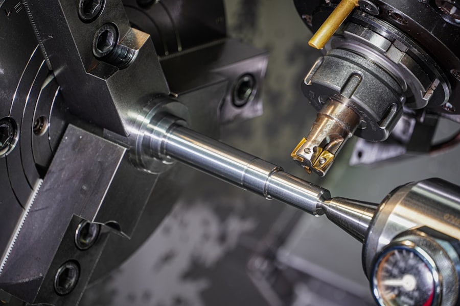 A metal rod being machined on a precision lathe